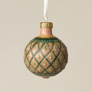 Intricately carved and glazed ceramic globe ornament with ivory satin ribbon –