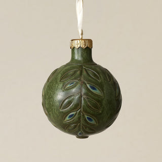 Intricately carved and glazed ceramic globe ornament with ivory satin ribbon –