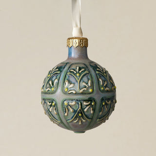 Intricately carved and glazed ceramic globe ornament with ivory satin ribbon –