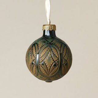 Intricately carved and glazed ceramic globe ornament with ivory satin ribbon –