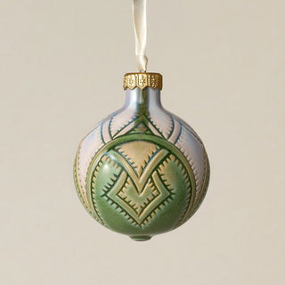 Intricately carved and glazed ceramic globe ornament with ivory satin ribbon –