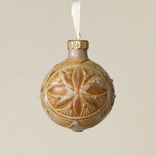Intricately carved and glazed ceramic globe ornament with ivory satin ribbon –
