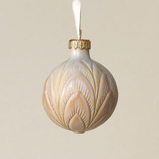 Intricately carved and glazed ceramic globe ornament with ivory satin ribbon –