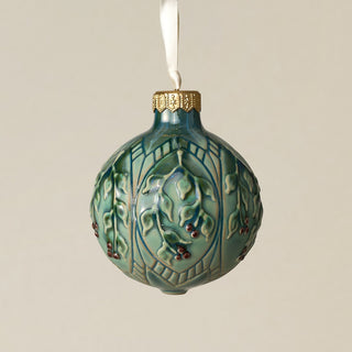 Intricately carved and glazed ceramic globe ornament with ivory satin ribbon –