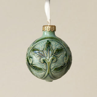 Intricately carved and glazed ceramic globe ornament with ivory satin ribbon –