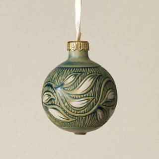 Intricately carved and glazed ceramic globe ornament with ivory satin ribbon –