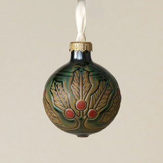 Intricately carved and glazed ceramic globe ornament with ivory satin ribbon –