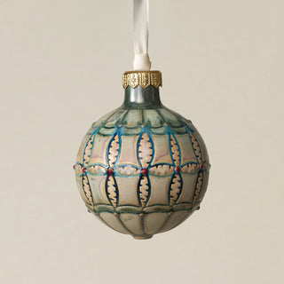 Intricately carved and glazed ceramic globe ornament with ivory satin ribbon –