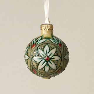 Intricately carved and glazed ceramic globe ornament with ivory satin ribbon –