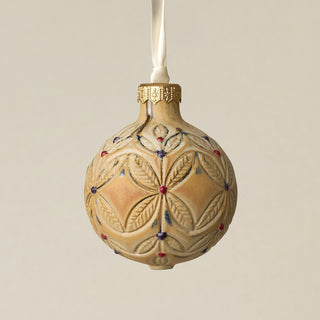 Intricately carved and glazed ceramic globe ornament with ivory satin ribbon –