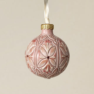 Intricately carved and glazed ceramic globe ornament with ivory satin ribbon –
