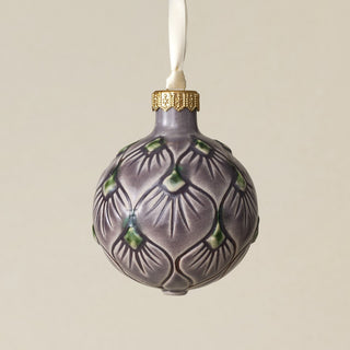 Intricately carved and glazed ceramic globe ornament with ivory satin ribbon –