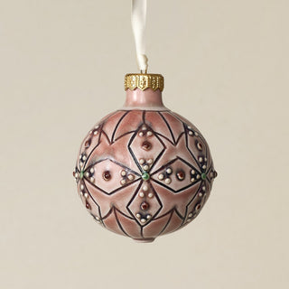 Intricately carved and glazed ceramic globe ornament with ivory satin ribbon –
