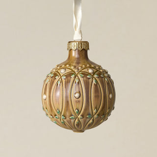 Intricately carved and glazed ceramic globe ornament with ivory satin ribbon –
