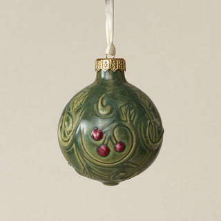 Intricately carved and glazed ceramic globe ornament with ivory satin ribbon –