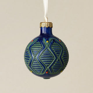 Intricately carved and glazed ceramic globe ornament with ivory satin ribbon –