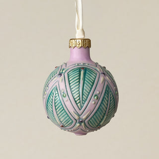Intricately carved and glazed ceramic globe ornament with ivory satin ribbon –