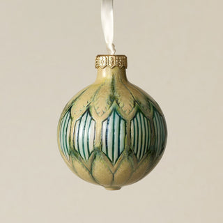 Intricately carved and glazed ceramic globe ornament with ivory satin ribbon –