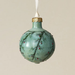 Intricately carved and glazed ceramic globe ornament with ivory satin ribbon –
