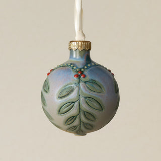 Intricately carved and glazed ceramic globe ornament with ivory satin ribbon –