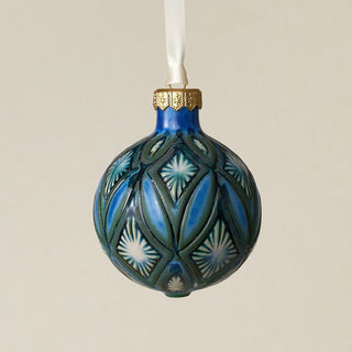 Intricately carved and glazed ceramic globe ornament with ivory satin ribbon –