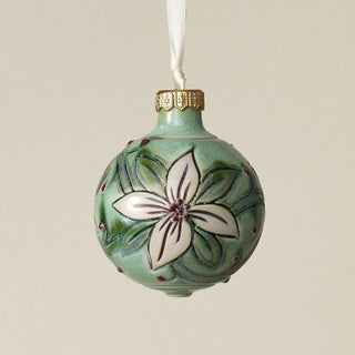 Intricately carved and glazed ceramic globe ornament with ivory satin ribbon –