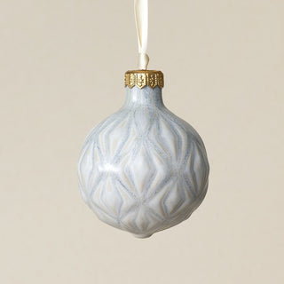Intricately carved and glazed ceramic globe ornament with ivory satin ribbon –