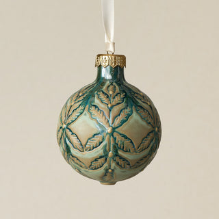 Intricately carved and glazed ceramic globe ornament with ivory satin ribbon –