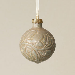 Intricately carved and glazed ceramic globe ornament with ivory satin ribbon –