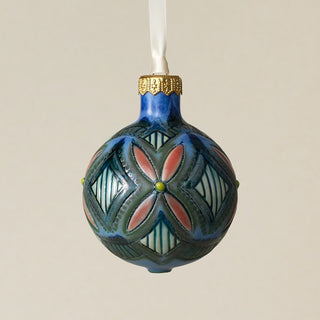 Intricately carved and glazed ceramic globe ornament with ivory satin ribbon –