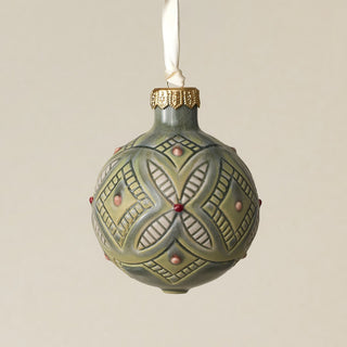 Intricately carved and glazed ceramic globe ornament with ivory satin ribbon –