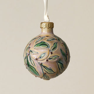 Intricately carved and glazed ceramic globe ornament with ivory satin ribbon –