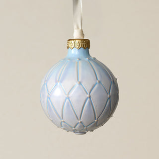 Intricately carved and glazed ceramic globe ornament with ivory satin ribbon –
