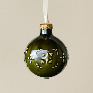 Intricately carved and glazed ceramic globe ornament with ivory satin ribbon – Ornament No. 263