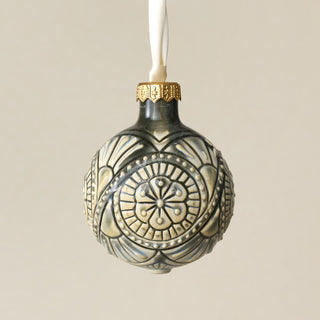 Intricately carved and glazed ceramic globe ornament with ivory satin ribbon – Ornament No. 264