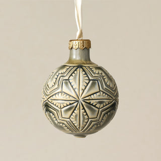 Intricately carved and glazed ceramic globe ornament with ivory satin ribbon – Ornament No. 270