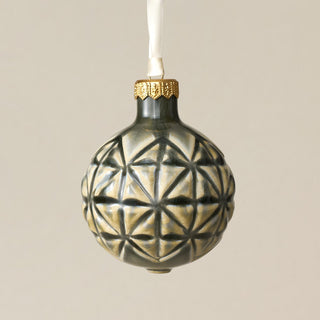 Intricately carved and glazed ceramic globe ornament with ivory satin ribbon – Ornament No. 271