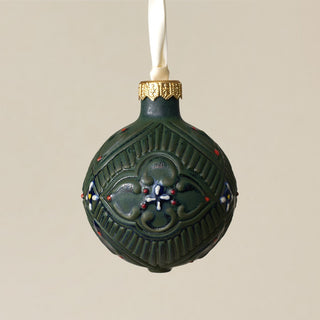 Intricately carved and glazed ceramic globe ornament with ivory satin ribbon – Ornament No. 281