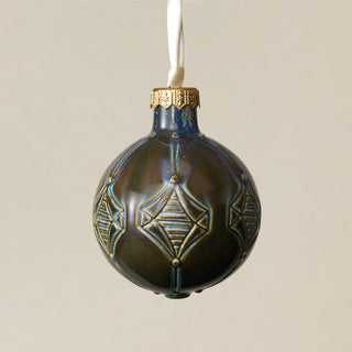 Intricately carved and glazed ceramic globe ornament with ivory satin ribbon – Ornament No. 284
