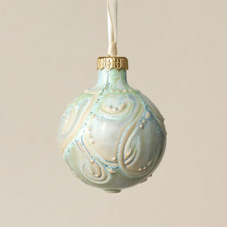 Intricately carved and glazed ceramic globe ornament with ivory satin ribbon – Ornament No. 286
