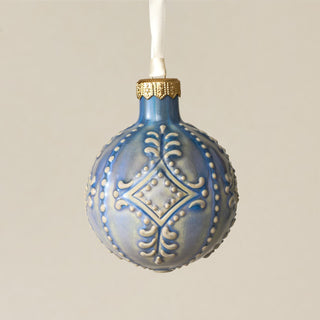 Intricately carved and glazed ceramic globe ornament with ivory satin ribbon – Ornament No. 291