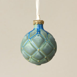 Intricately carved and glazed ceramic globe ornament with ivory satin ribbon – Ornament No. 298