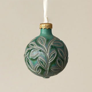 Intricately carved and glazed ceramic globe ornament with ivory satin ribbon – Ornament No. 300
