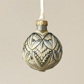 Intricately carved and glazed ceramic globe ornament with ivory satin ribbon – Ornament No. 309