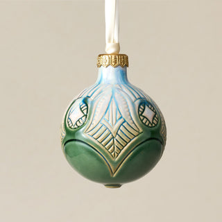 Intricately carved and glazed ceramic globe ornament with ivory satin ribbon – Ornament No. 314