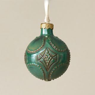 Intricately carved and glazed ceramic globe ornament with ivory satin ribbon – Ornament No. 315