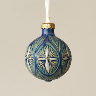 Intricately carved and glazed ceramic globe ornament with ivory satin ribbon – Ornament No. 318
