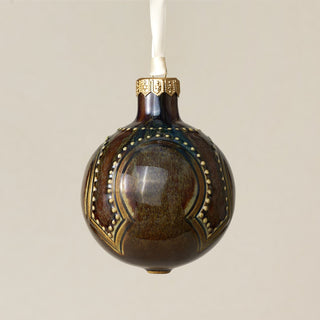 Intricately carved and glazed ceramic globe ornament with ivory satin ribbon – Ornament No. 324