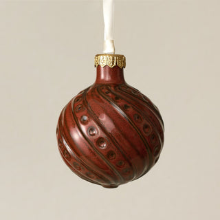 Intricately carved and glazed ceramic globe ornament with ivory satin ribbon – Ornament No. 325