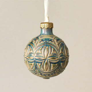 Intricately carved and glazed ceramic globe ornament with ivory satin ribbon – Ornament No. 329